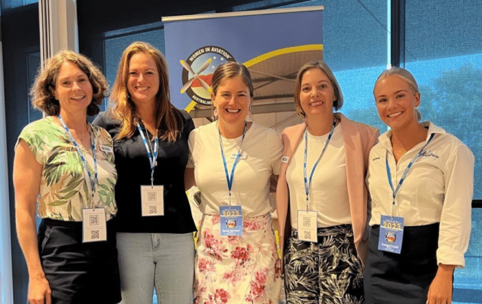 Five happy women smile as they partake in the Women in Aviation 2023 Scholarship Program supported by Southpac Aerospace.